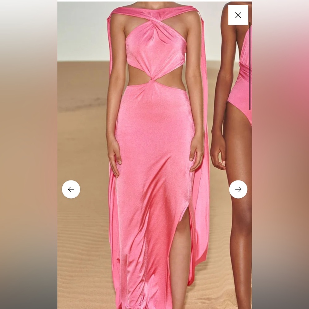 halter-style maxi dress with alluring side cut-outs,& gracefully hanging straps.